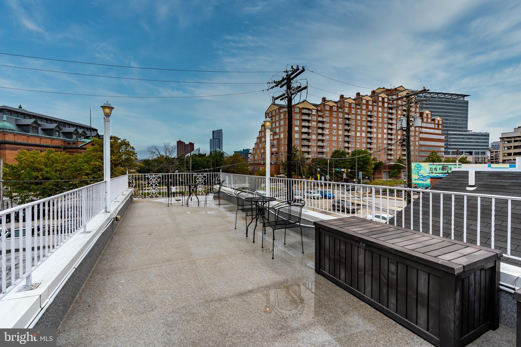 a view of a balcony and chairs