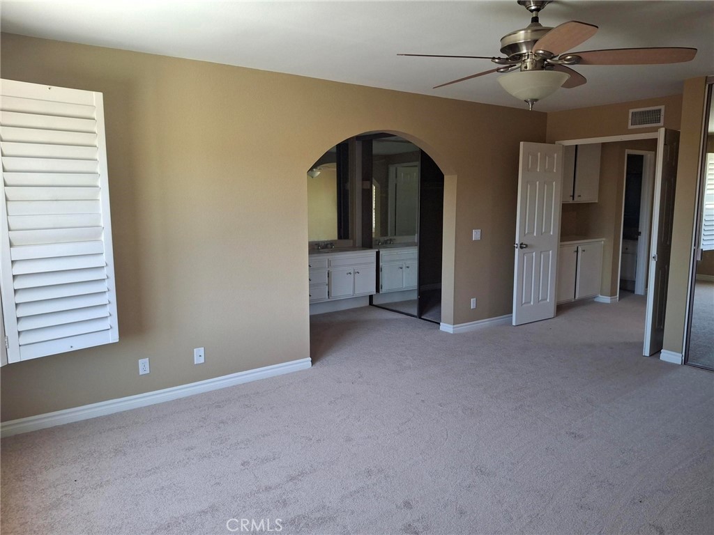 12 Hidalgo Irvine, CA 92620 - Photo 15 of 24 a view of a livingroom with a ceiling fan and window