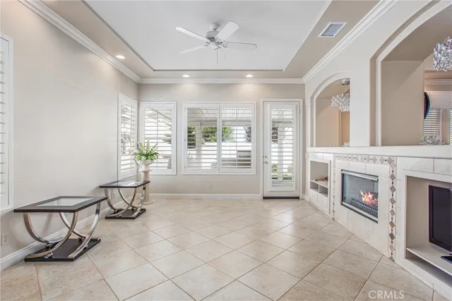 a view of a livingroom with furniture and a fireplace