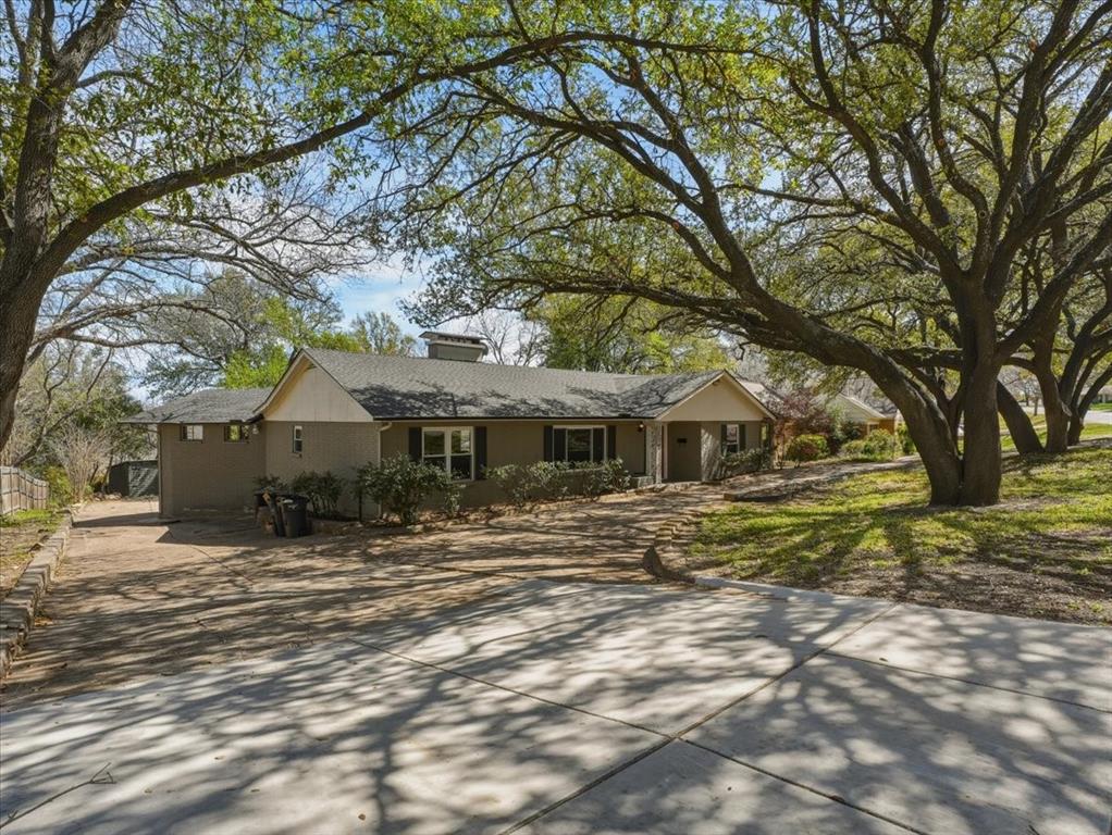 3863 Clayton Road East Fort Worth, TX 76116 - Photo 2 of 39 a view of a house with a yard