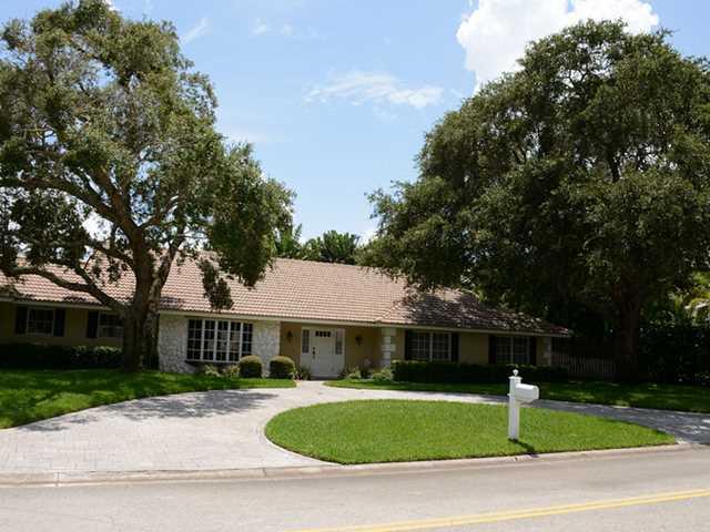 101 South River Road Stuart, FL 34996 - Photo 2 of 22 a view of a white house with a swimming pool