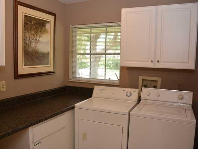 101 South River Road Stuart, FL 34996 - Photo 9 of 22 a utility room with dryer and washer