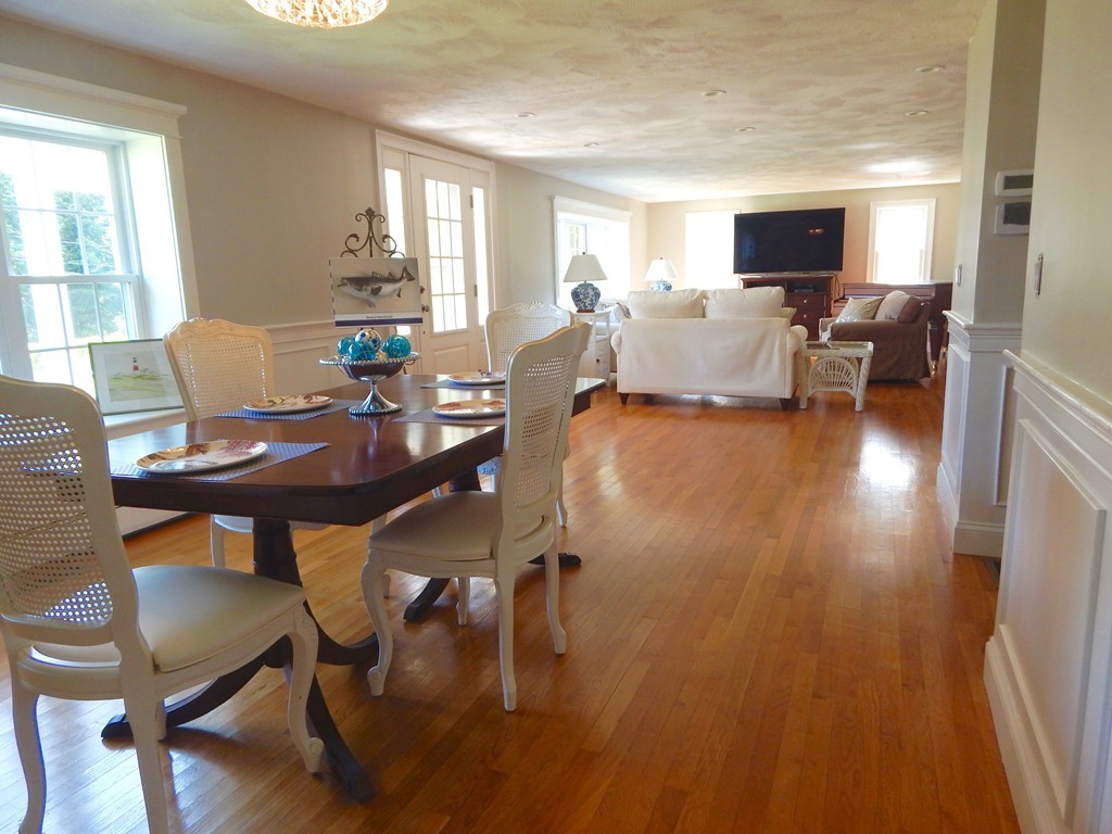 28 Stonehorse Road Barnstable, MA 02655 - Photo 11 of 23 a view of a dining room with furniture window and wooden floor