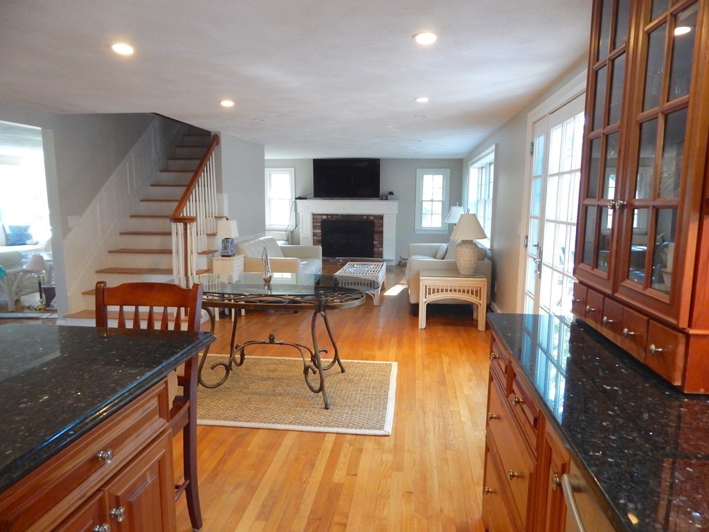 28 Stonehorse Road Barnstable, MA 02655 - Photo 15 of 23 a living room with furniture a flat screen tv and a table