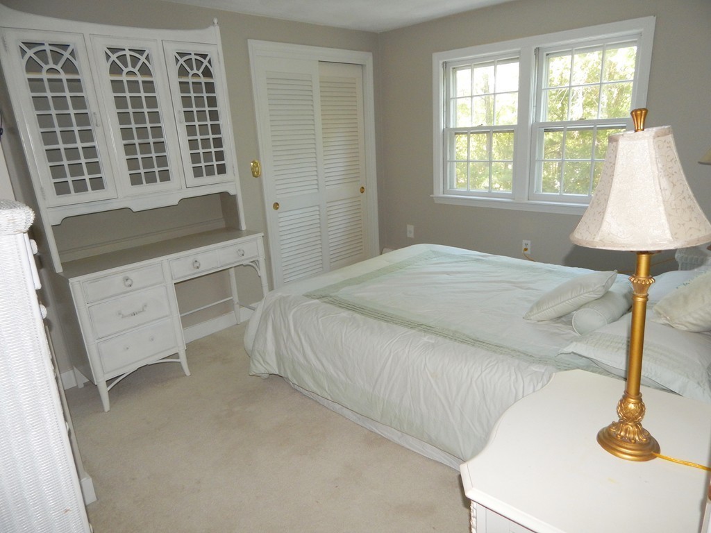 28 Stonehorse Road Barnstable, MA 02655 - Photo 17 of 23 a bedroom with a bed and a window