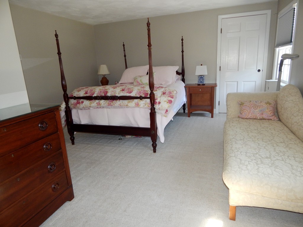 28 Stonehorse Road Barnstable, MA 02655 - Photo 21 of 23 a bedroom with a bed and a dresser