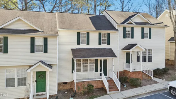 a front view of a house with a porch