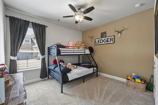 a bathroom with a bathtub a sink and a large mirror