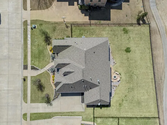 an aerial view of a city with ocean