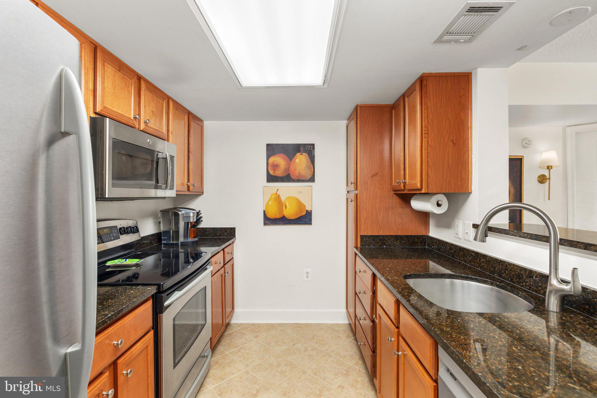 11800 Sunset Hills Road, Unit 815 Reston, VA 20190 - Photo 11 of 61 Ceramic Tile Floor Kitchen w Stainless Appliances