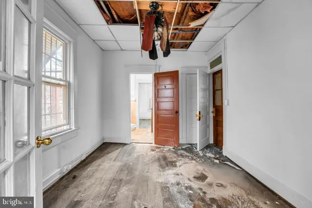 an empty room with windows