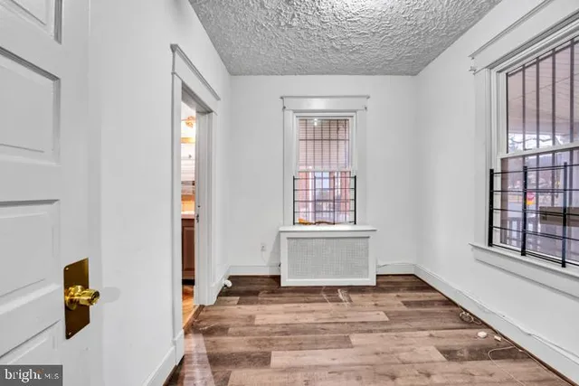 a view of an empty room and window