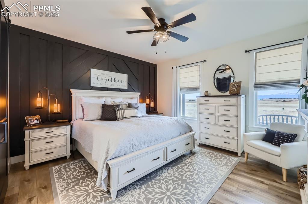 8735 Palomino Rdg View Peyton, CO 80831 - Photo 14 of 48 a bedroom with bed and window