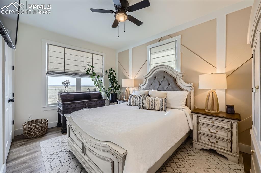 8735 Palomino Rdg View Peyton, CO 80831 - Photo 20 of 48 a bedroom with a bed and a window