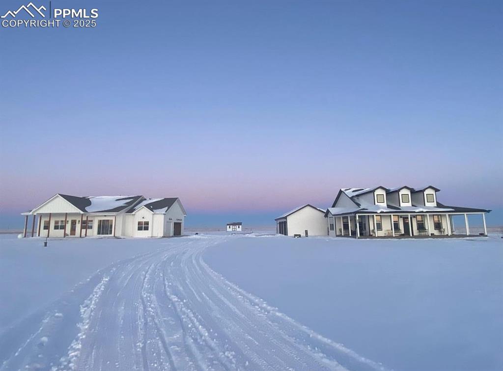 8735 Palomino Rdg View Peyton, CO 80831 - Photo 2 of 48 a bathroom with a sink and a mirror