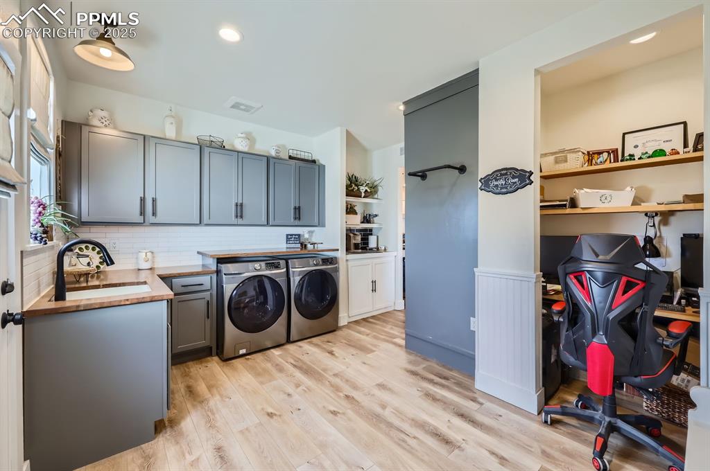 8735 Palomino Rdg View Peyton, CO 80831 - Photo 23 of 48 a view of a kitchen with fridge and rack
