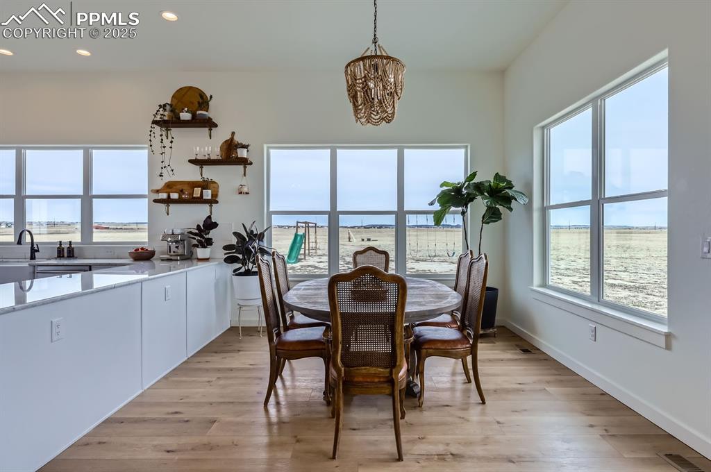 8735 Palomino Rdg View Peyton, CO 80831 - Photo 32 of 48 a dining room with furniture and window