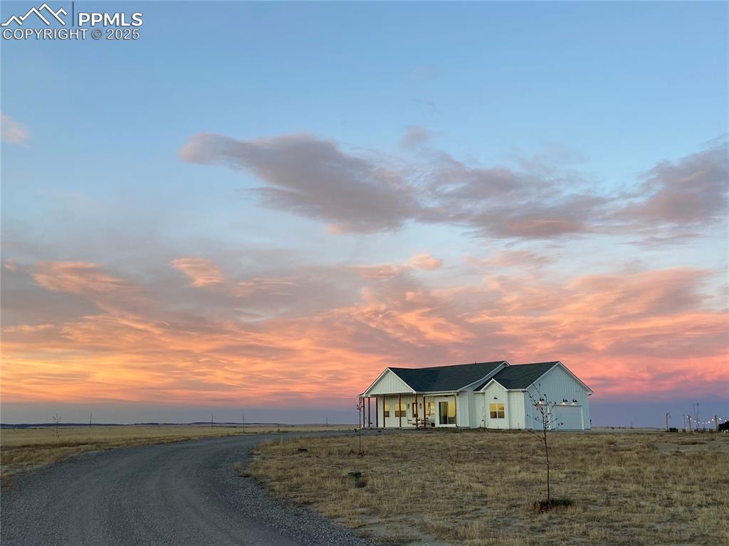 8735 Palomino Rdg View Peyton, CO 80831 - Photo 4 of 48 a view of houses with sky view