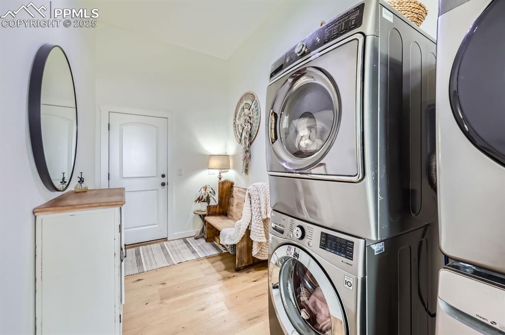 8735 Palomino Rdg View Peyton, CO 80831 - Photo 41 of 48 a view of a storage & utility room with washer and dryer