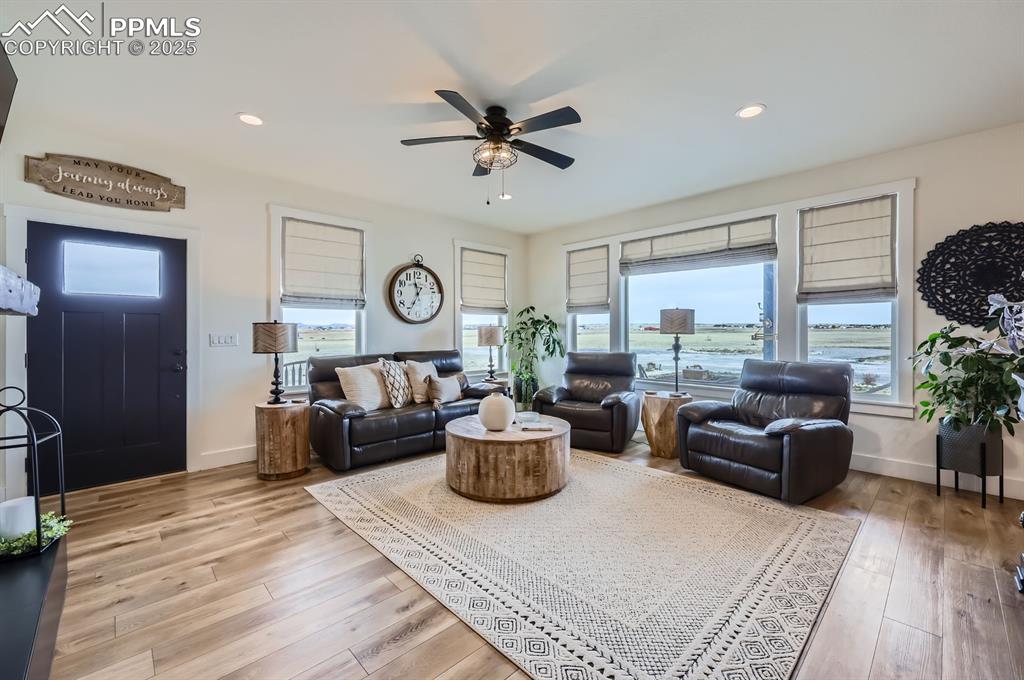 8735 Palomino Rdg View Peyton, CO 80831 - Photo 7 of 48 a living room with furniture and windows