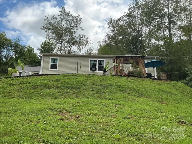 a house view with a garden space