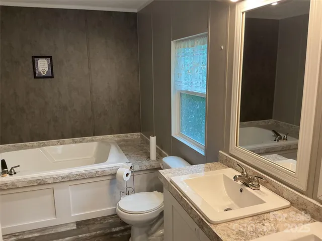 a bathroom with a sink and a toilet