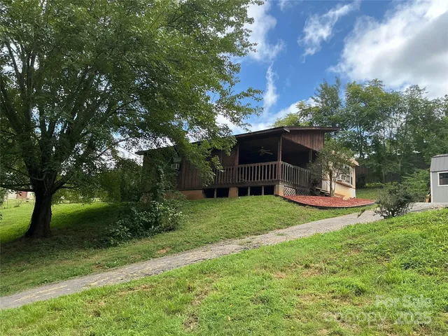 a view of a wooden deck and garden