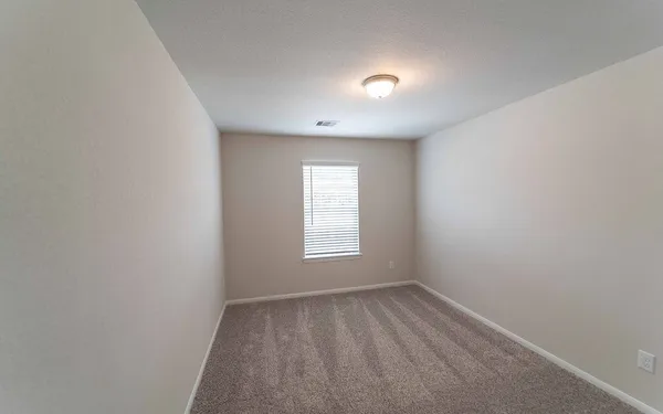 a view of empty room with window