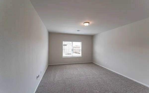 an empty room with a window