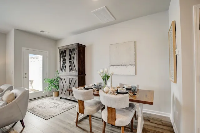 a view of a dining room with furniture