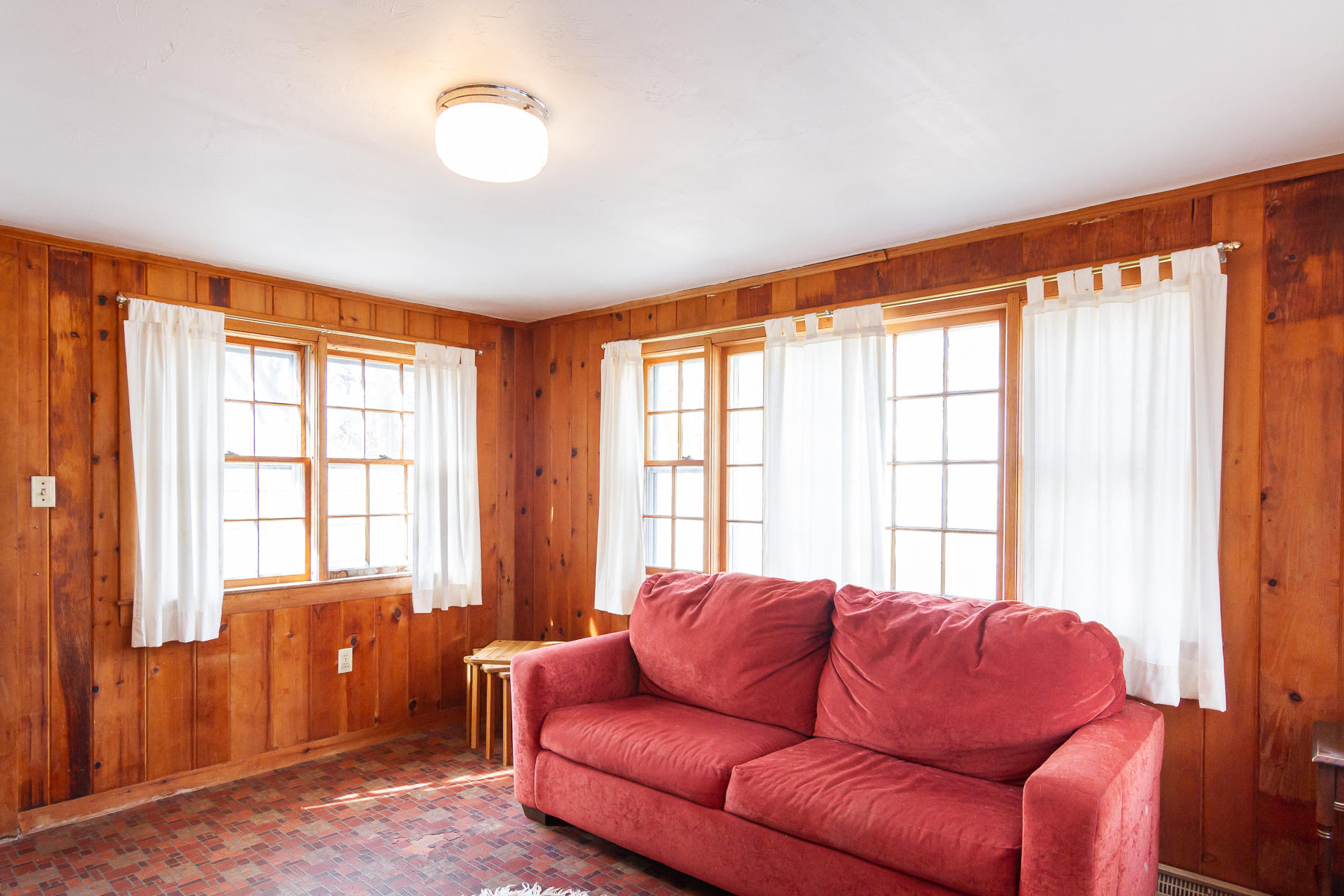 73 Santucket Road West Dennis, MA 02670 - Photo 12 of 36 a living room with furniture and a window