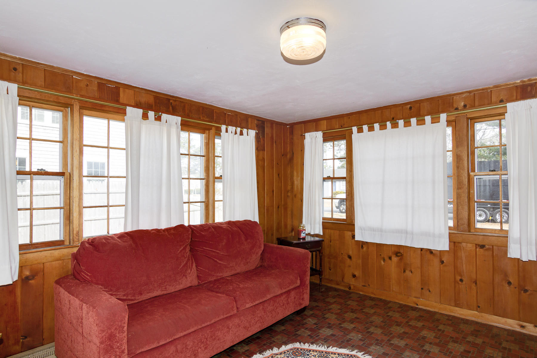73 Santucket Road West Dennis, MA 02670 - Photo 14 of 36 a living room with furniture and a window
