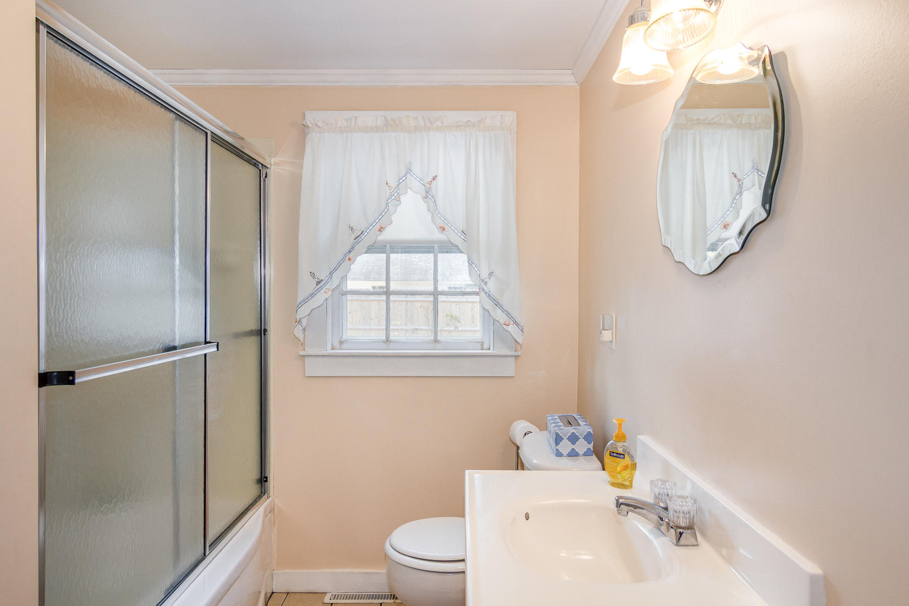 73 Santucket Road West Dennis, MA 02670 - Photo 20 of 36 a bathroom with a sink toilet and shower