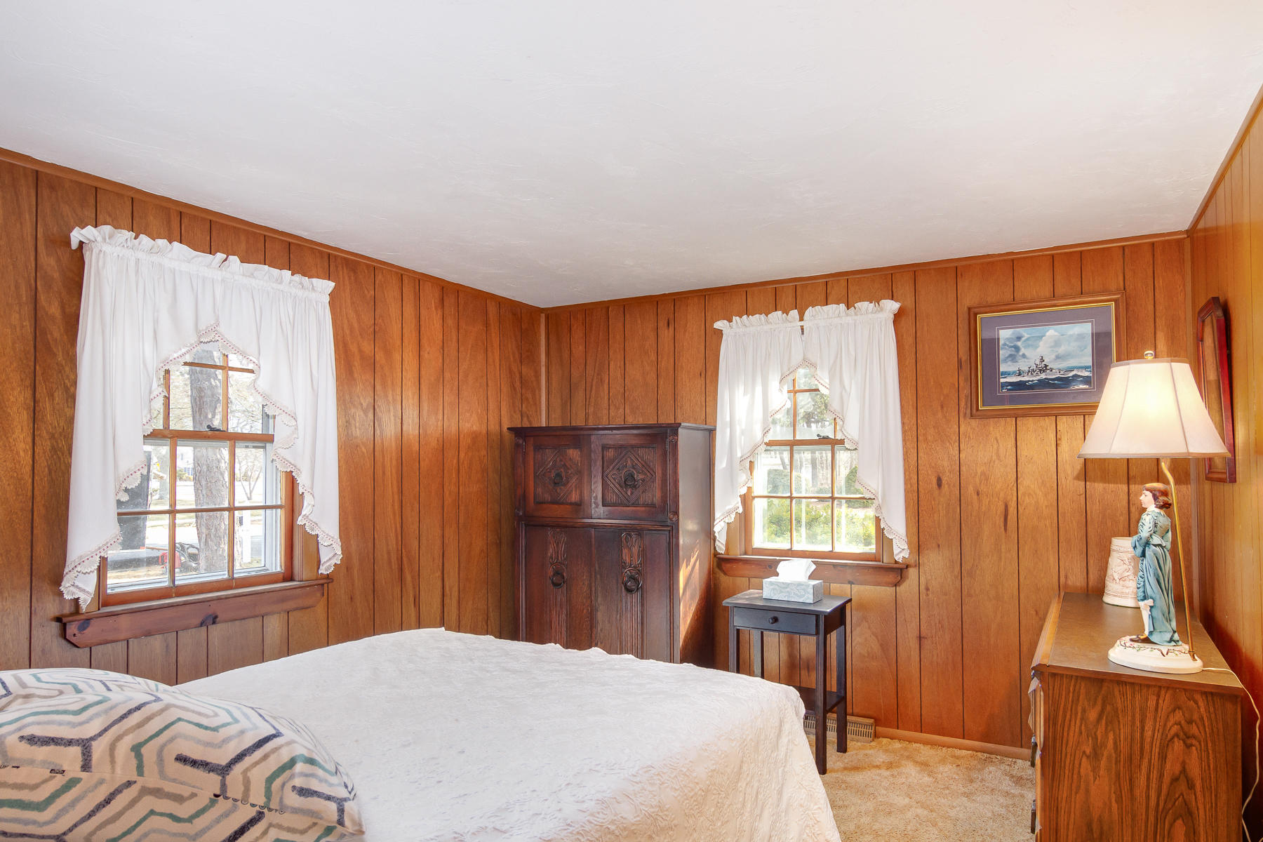 73 Santucket Road West Dennis, MA 02670 - Photo 22 of 36 a bedroom with a bed and a window