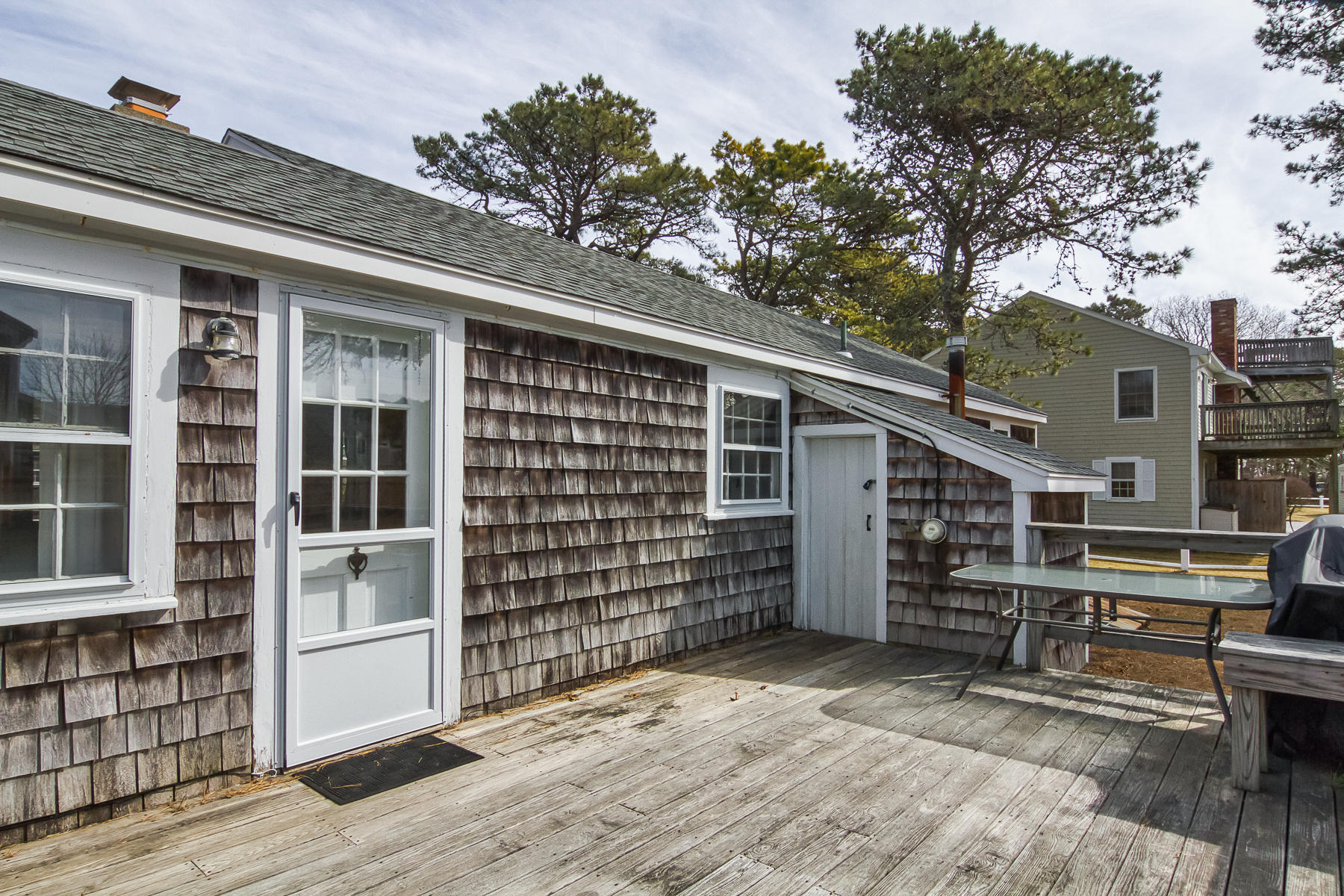 73 Santucket Road West Dennis, MA 02670 - Photo 31 of 36 a view of a house with a large window