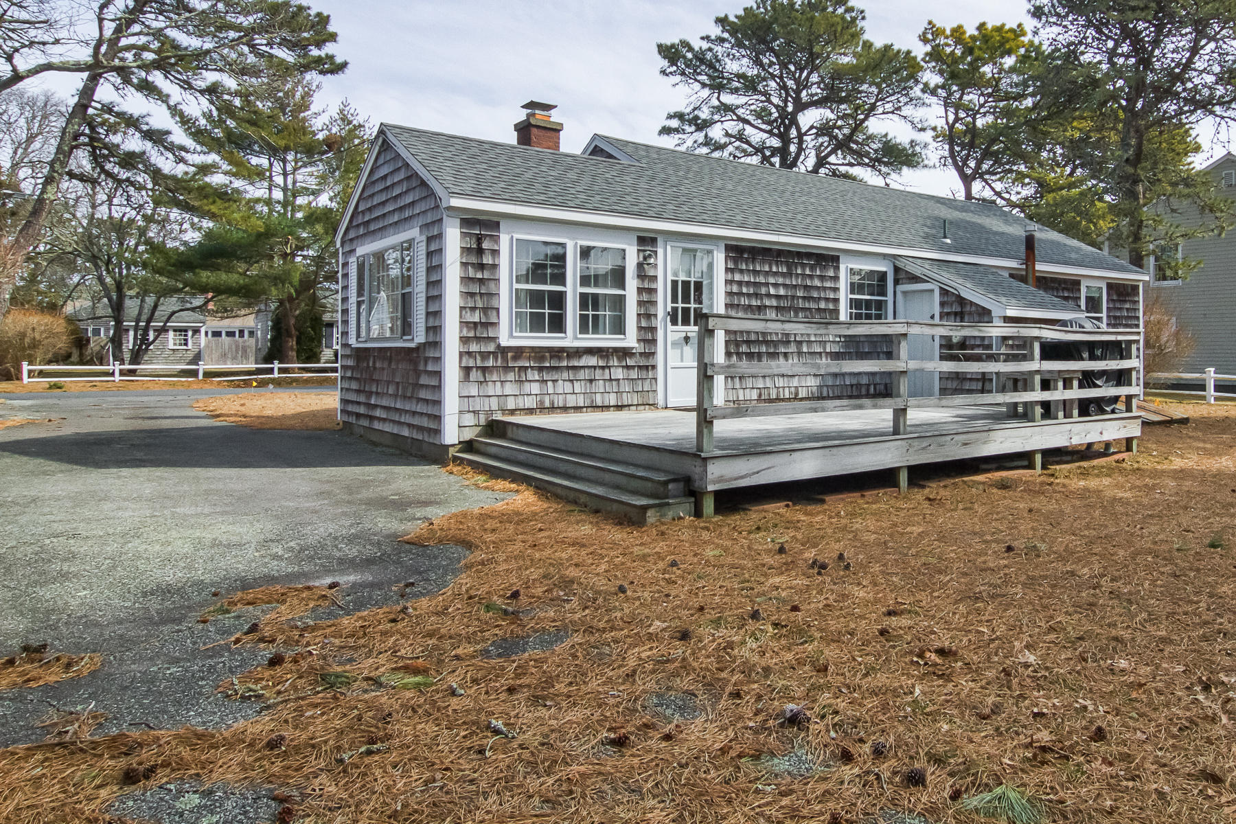 73 Santucket Road West Dennis, MA 02670 - Photo 4 of 36 a view of back yard of the house
