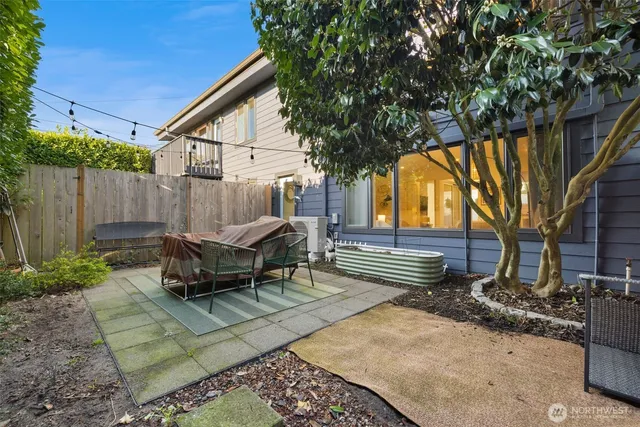 a view of a bench in a backyard
