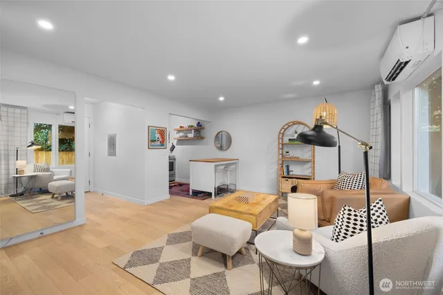 a living room with furniture and a table