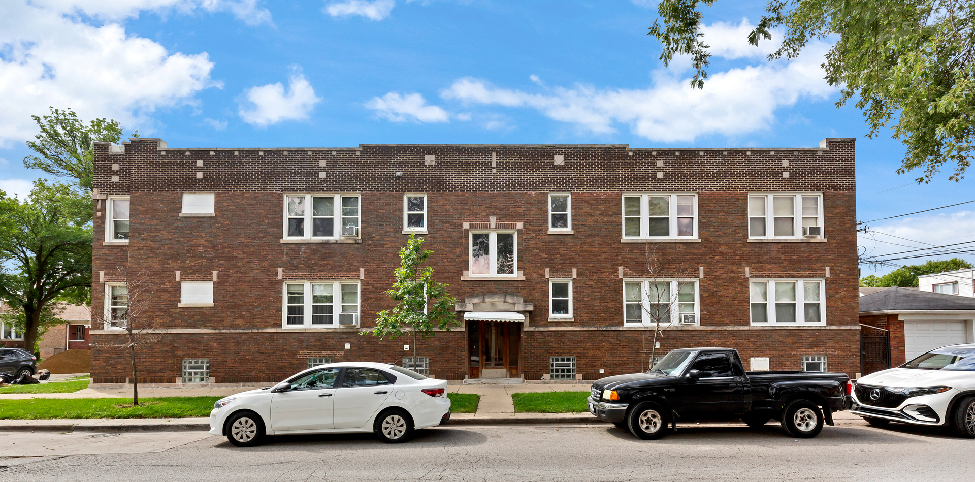 a car parked in front of a house