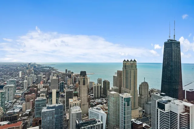 a view of city with tall buildings