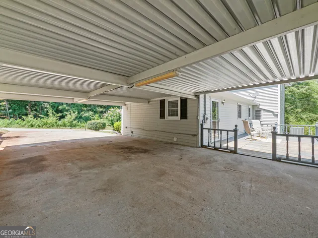 a view of backyard with porch