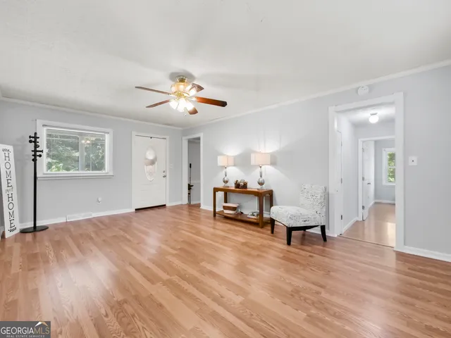 a view of livingroom with furniture and a window
