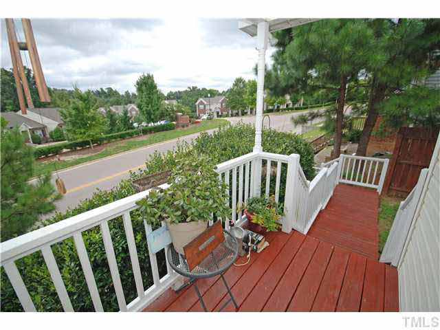 4712 Valley Stream Drive Raleigh, NC 27616 - Photo 2 of 25 a view of a wooden deck with furniture
