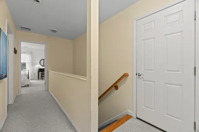 a view of a deck with table and chairs with wooden floor and fence
