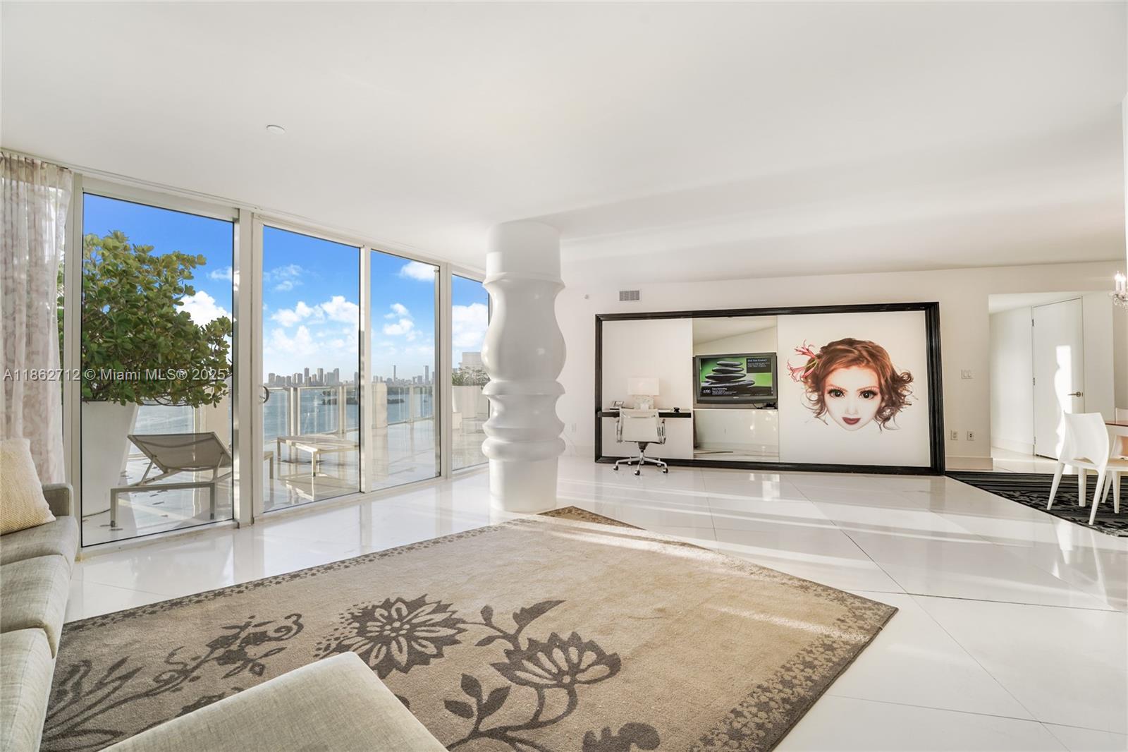 1100 West Avenue, Unit TS4 Miami Beach, FL 33139 - Photo 6 of 18 a view of a livingroom with a flat screen tv