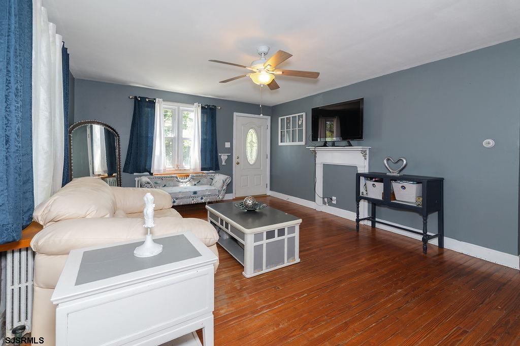 19 South 1st Road Hammonton, NJ 08037 - Photo 5 of 36 a living room with furniture and a wooden floor