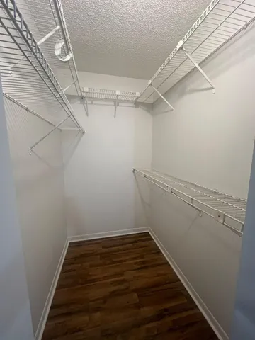 a view of a room with racks on the wall