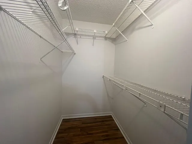 a view of a room with racks on the wall