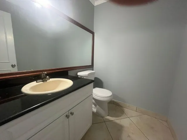 a bathroom with a sink and a toilet