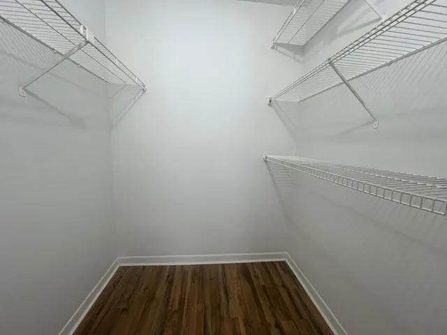 a view of a room with racks on the wall